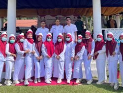 Puskesmas Paguyaman Pantai Meriahkan HUT RI ke-80 Lewat Gerak Jalan