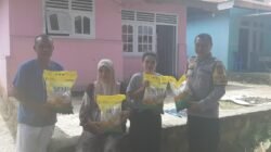 Kapolsek Botumoito Bagikan Beras Murah untuk Ringankan Beban Warga