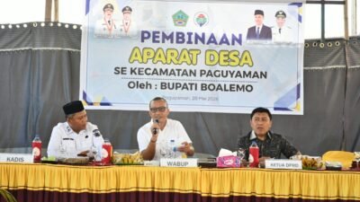 Di Hadapan Aparat Desa se kecamatan Paguyaman, Wabup Lahmuddin Tekankan Musyawarah dan Kekompakan